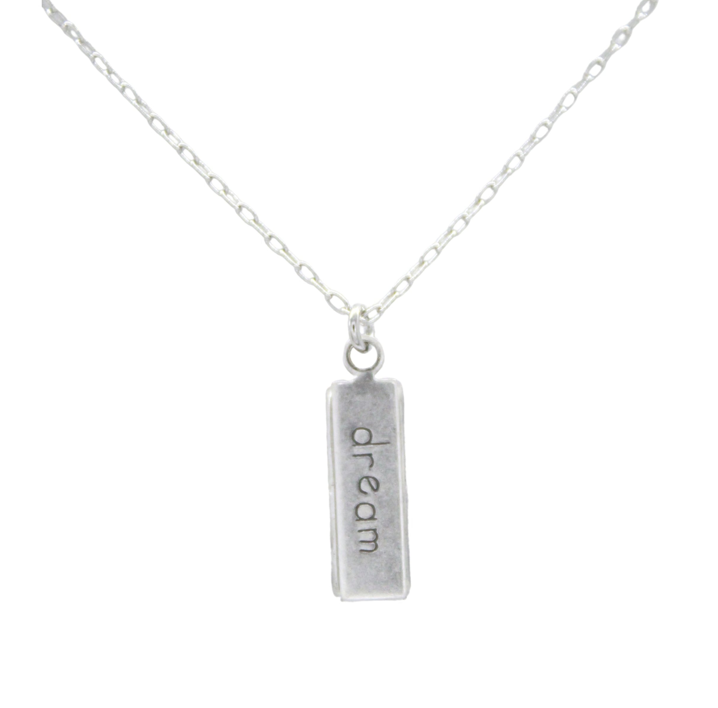 A handmade Mini Seahorse Soft Necklace by Firefly, featuring a unique design, is displayed on a white background.