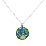 The Beach Glass Round Soft Necklace from Firefly Jewelry features a colorful, abstract tree design with blue, pink, and green accents and sparkling stones—an eye-catching handmade piece from Firefly.