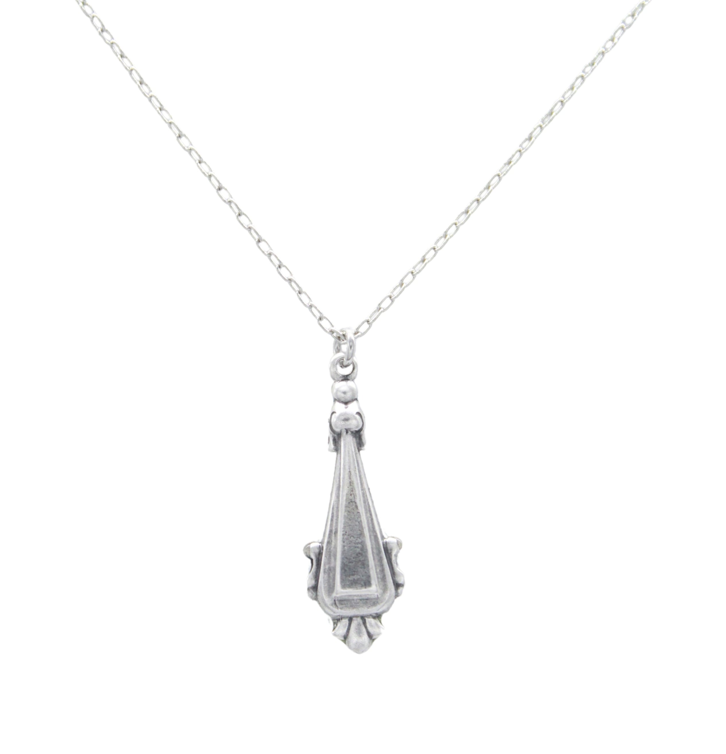 The Beach Glass Drop Soft Necklace by Firefly features a delicate chain and a geometric, vintage-inspired pendant, handmade in Guatemala.