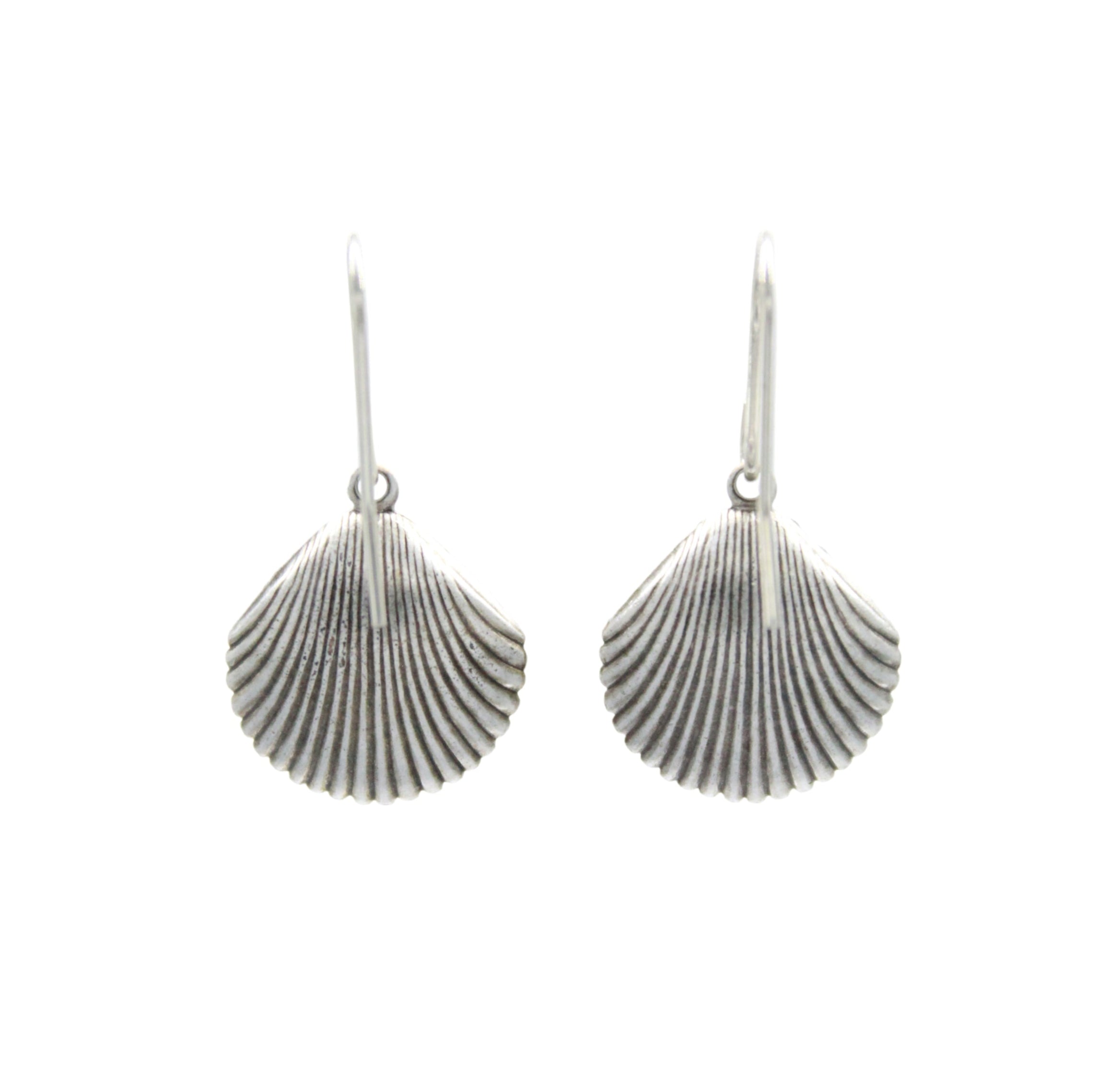 The Playa Starfish Shell Soft Earrings by Firefly feature handmade silver scallop shells with detailed ridges, crafted in Guatemala, displayed against a plain white background.