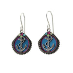 The Playa Anchor Soft Earrings by Firefly feature silver, shell-shaped blue pendants with a central anchor design and colorful accents. Handmade in Guatemala, theyre a stunning fair-trade jewelry piece.