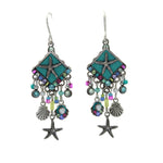 The Playa Starfish Fringe Soft Earrings by Firefly feature starfish motifs, blue-green diamond centers, colorful beads, shell charms, and dangling starfish on silver hooks—beautiful handmade fair-trade jewelry.