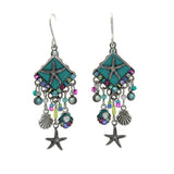 The Playa Starfish Fringe Soft Earrings by Firefly feature starfish motifs, blue-green diamond centers, colorful beads, shell charms, and dangling starfish on silver hooks—beautiful handmade fair-trade jewelry.