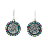 The Playa Sand Dollar Soft Earrings by Firefly feature a detailed silver floral center, multicolored gems, and silver hooks—handmade artisanal jewelry that highlights the craftsmanship of Firefly Jewelry.