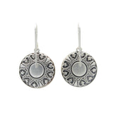 The Playa Sand Dollar Soft Earrings by Firefly are round, silver dangles with intricate embossed patterns and hooks—handmade jewelry from Firefly, perfect for any occasion.