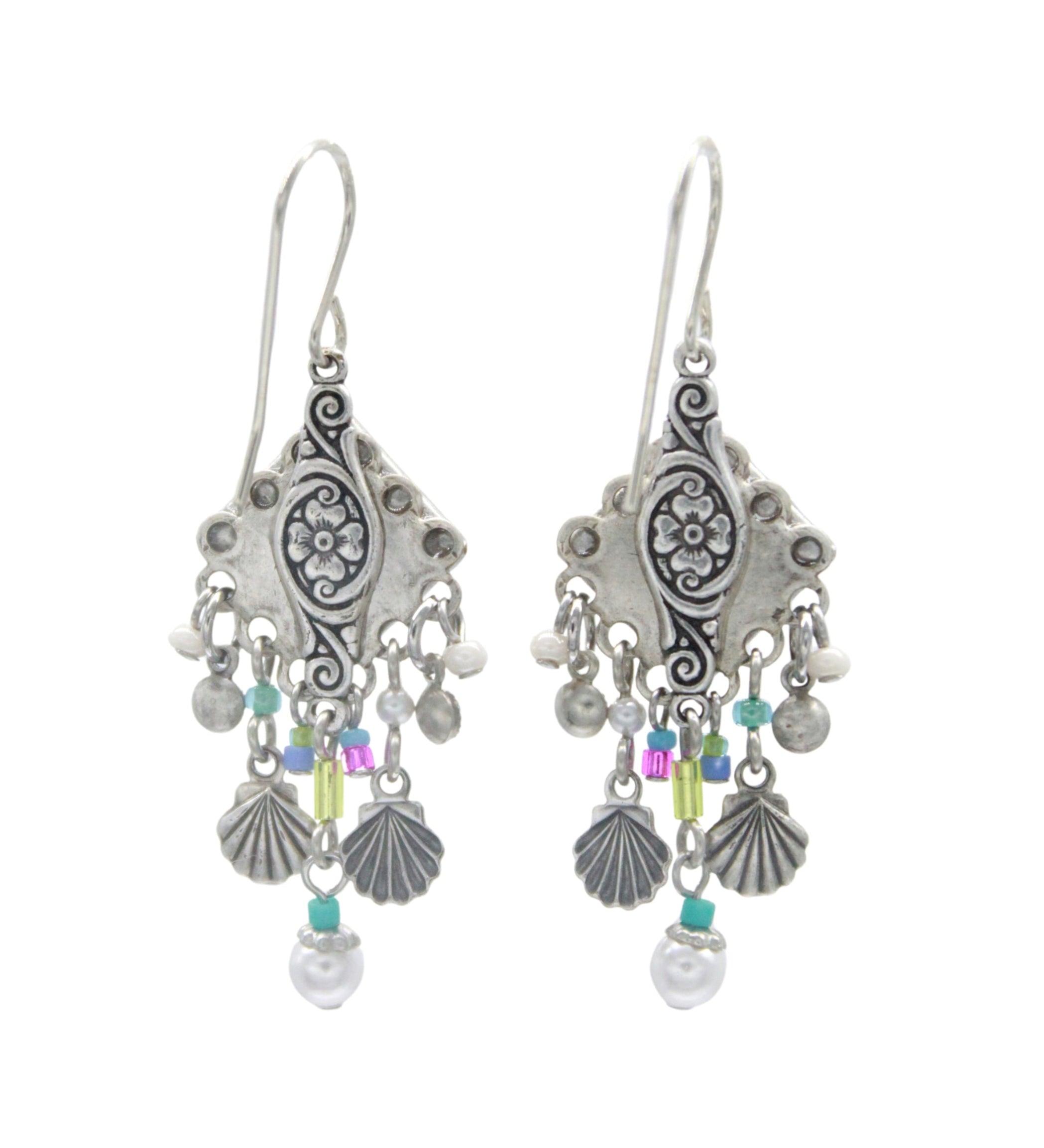 Firefly Beach Pearl Diamond Shell w/Fringe Soft Earrings feature ornate silver design, floral engravings, dangling seashell-shaped charms, colorful beads, and white pearl accents. Handmade by Firefly in Guatemala.