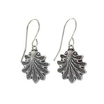 The Beach Glass Aqua Shell Soft Earrings by Firefly are Fair-Trade, hypoallergenic dangle earrings with textured leaf charms and simple hooks—perfect for adding stylish, ethical flair to any look.