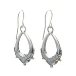 The Beach Glass Oval Hoop Soft Earrings by Firefly feature handmade sterling silver drop designs with subtle detailing and a polished finish, offering timeless elegance in the brand’s signature style.