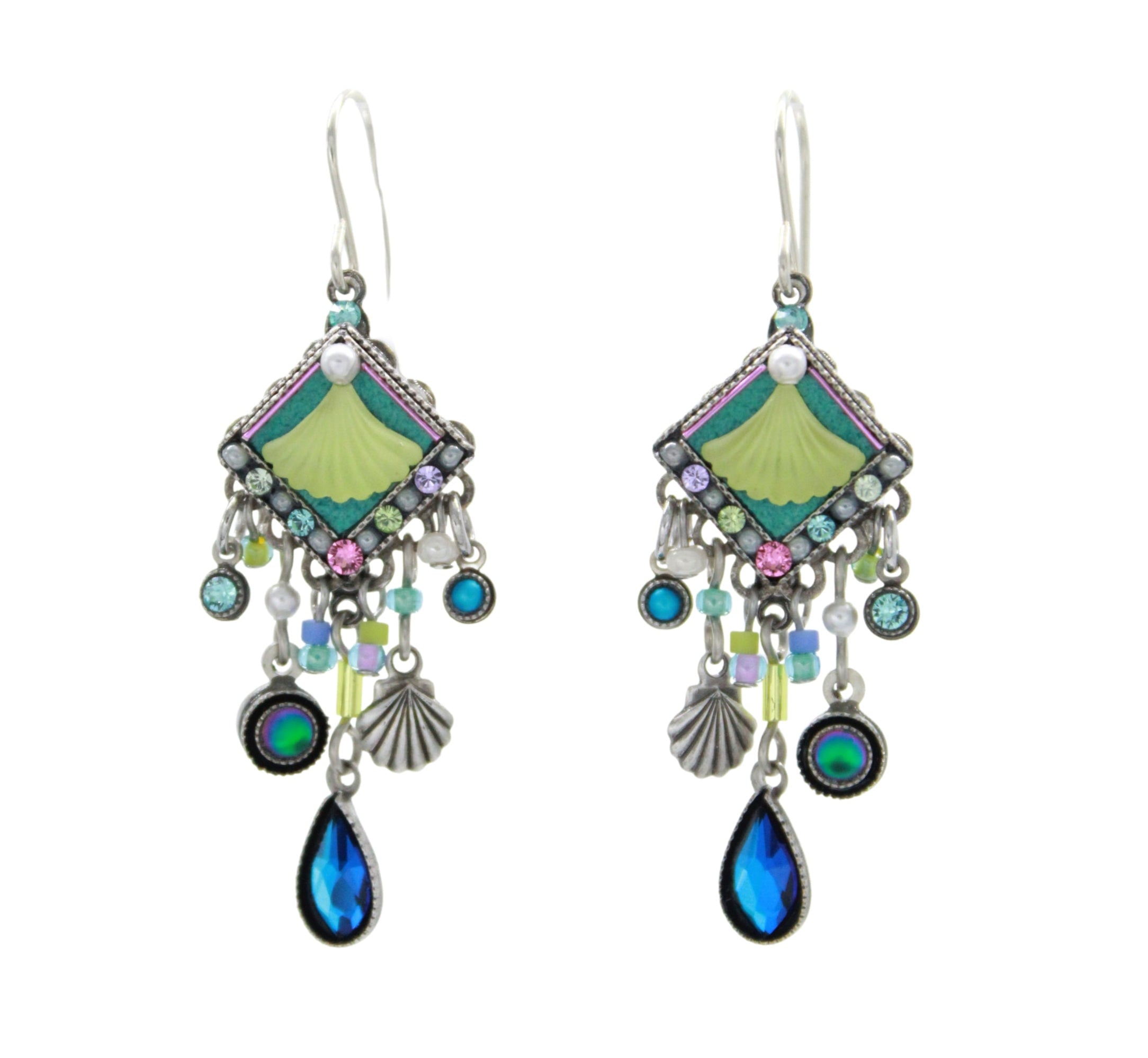 The Beach Glass Water Fall Soft Earrings by Firefly feature ornate silver-tone dangles with green fan tops, blue and purple gems, shell charms, and teardrop blue crystals—unique handmade jewelry inspired by fair-trade craftsmanship.