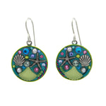 Add a vibrant touch to your handmade jewelry collection with Firefly’s Beach Glass Round Soft Earrings, featuring abstract patterns and raised shapes like circles and fans on a green background.