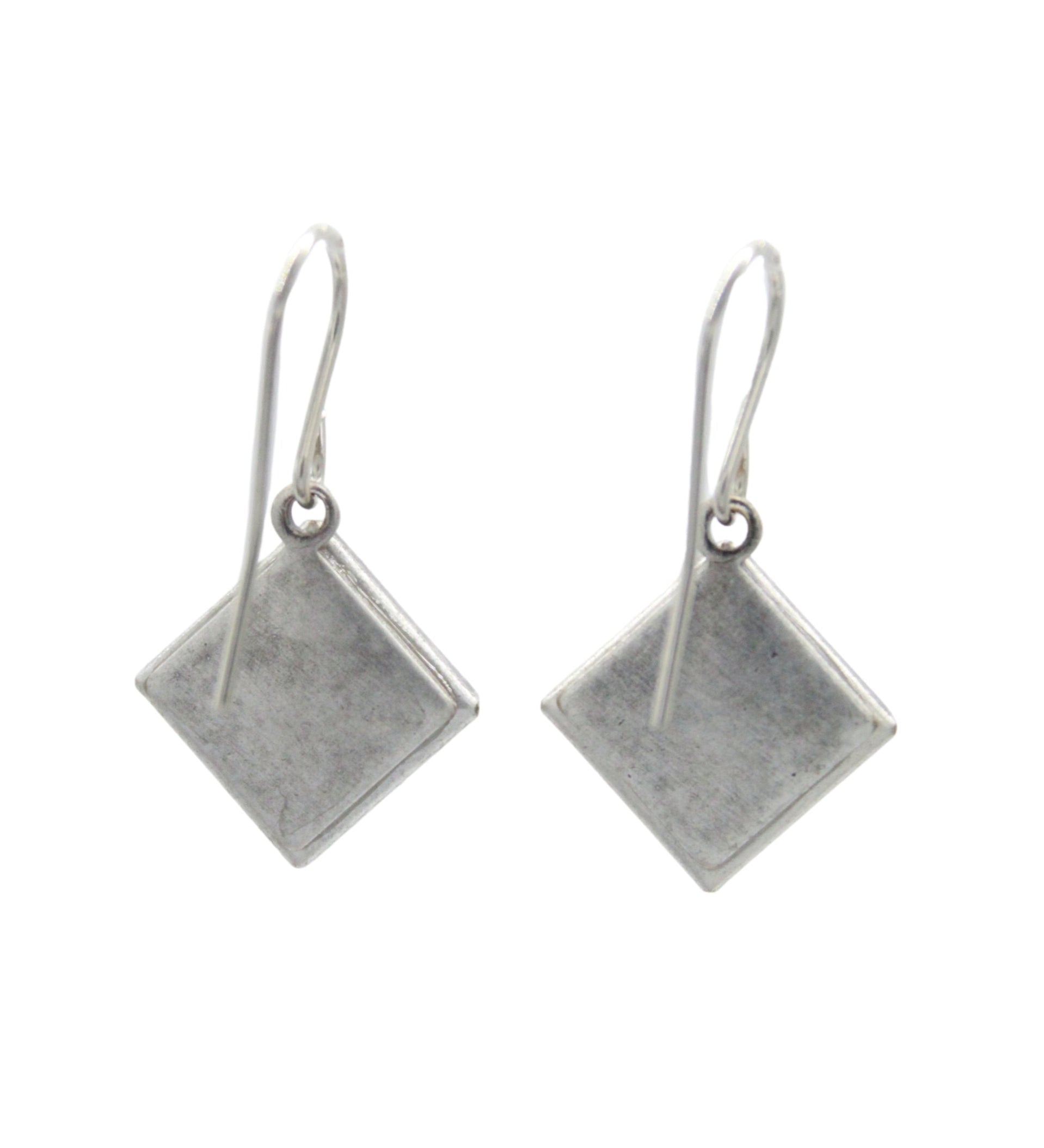 The Beach Glass Simple Diamond Soft Earrings by Firefly feature flat, diamond-shaped pendants on simple hooks—a timeless handmade addition to your jewelry collection.