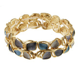 Origin Matte Gold Blue Tone Leaves bracelet featuring interlocking leaf shapes in shades of blue and gray.