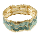 Origin Matte Gold Green-Aqua Wavy Stretch Bracelet featuring matte gold wavy panels with green and aqua enamel accents.