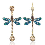 Anne Koplik Designs, Inc. Enamel & Stone Dragonfly w/Amber Drop Earrings feature artisanal teal dragonflies with blue and green jeweled wings, brown gemstone bodies, amber drops, and gold-tone hooks for a nature-inspired touch.