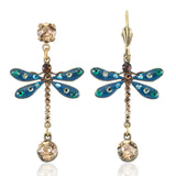 Anne Koplik Designs, Inc. Enamel & Stone Dragonfly w/Amber Drop Earrings feature artisanal teal dragonflies with blue and green jeweled wings, brown gemstone bodies, amber drops, and gold-tone hooks for a nature-inspired touch.