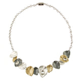 Origin Leaf Petal Crystal Gold/Lt Gray/Dk Gray Combination Necklace featuring alternating gold, silver, and gray petal-shaped charms interspersed with small teardrop crystals on a silver-tone chain.