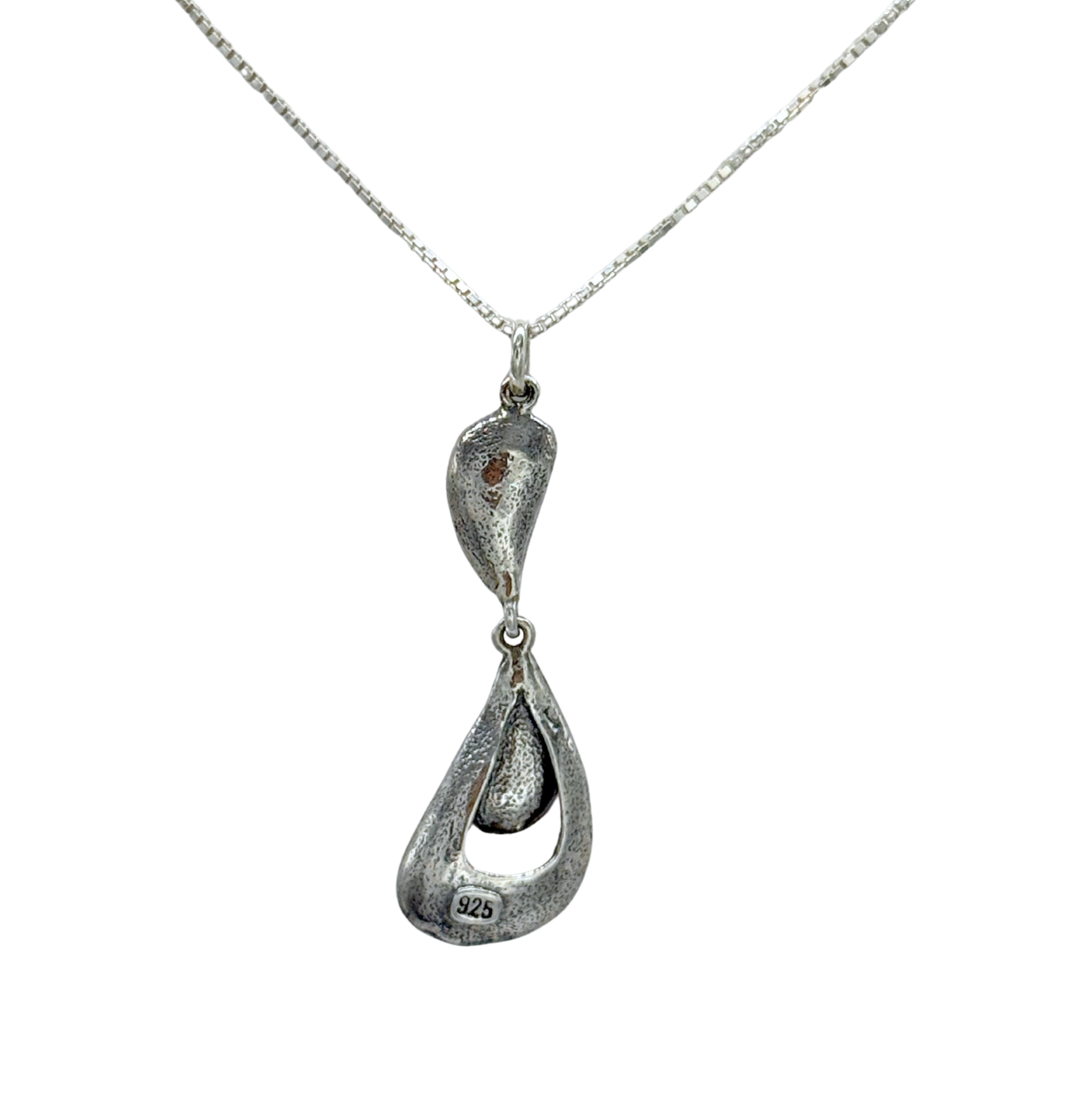 The Sterling Silver 2 Part Freshwater Pearl Necklace by Mediterranean Artists Co. Sterling Silver features an abstract teardrop pendant with two connected loops and a 925 stamp—ideal for minimalist jewelry lovers.