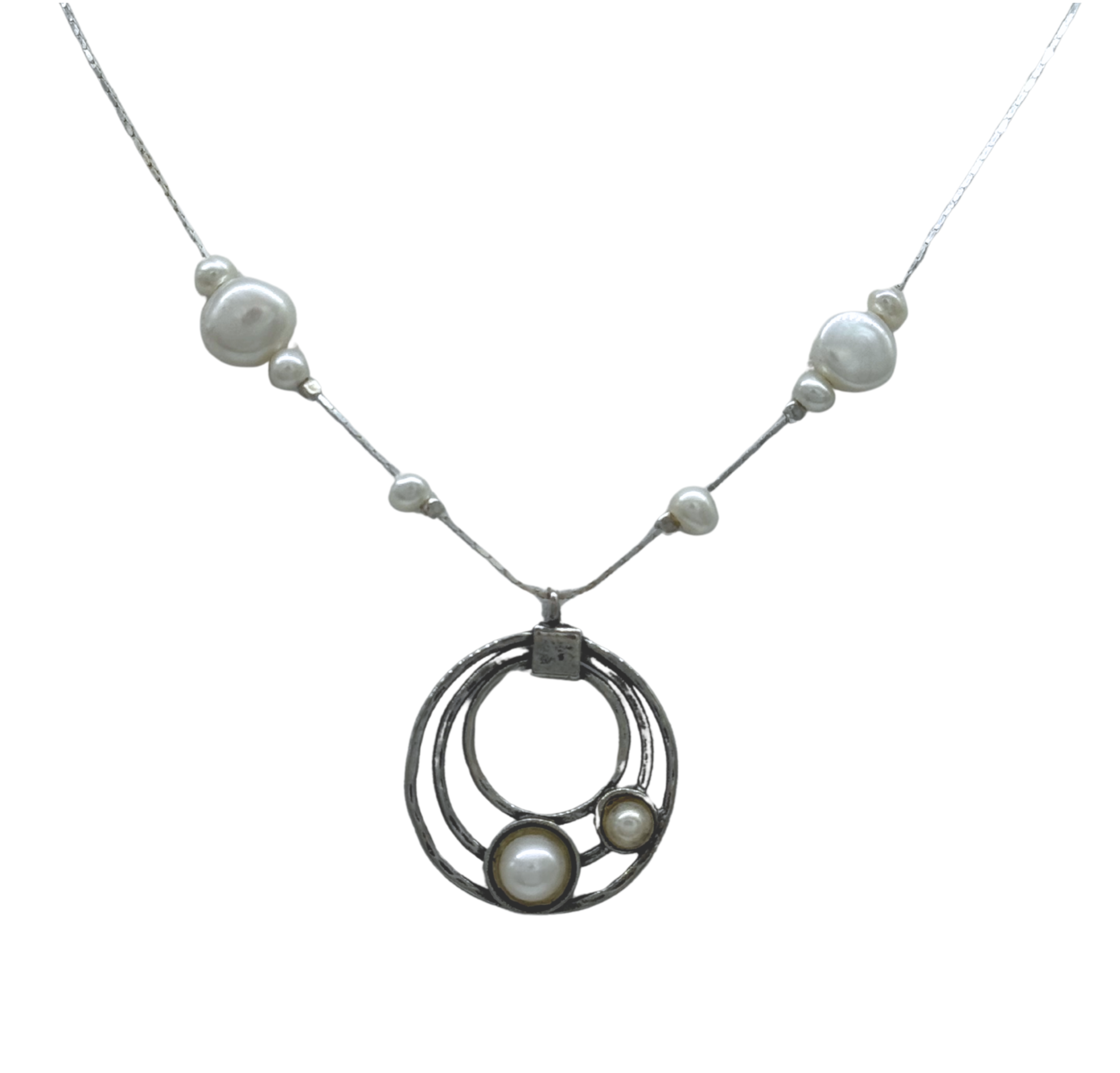 The Sterling Silver Circles Freshwater Pearl Station Chain Necklace by Mediterranean Artists Co. Sterling Silver features three interlocking circles, each with a pearl, and pearls spaced along the chain. Shown on a white background.