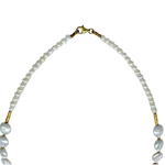 The Mediterranean Artists Co. Two Tone Gold Plated Freshwater Pearl Collar with Swirls features small white freshwater pearls, gold accents, and a gold-plated sterling silver lobster clasp, shown on a white background.
