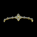 The Gold Pave Clover CZS Bracelet by Be-Je Designs features a sparkling clover motif with CZ accents for everyday luxury, shown against a black background.
