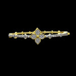 Be-Je Designs' Gold Pave Clover CZS Bracelet features a central clover design encrusted with sparkling stones and additional accents along the band—a chic, everyday accessory that stands out against a black background.