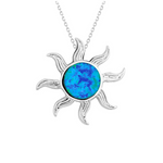 The Classic of New York Caribbean Opal Inlay Sun Pendant features a sterling silver sun-shaped design with a blue-green opal centerpiece on a delicate chain.