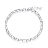 The Sterling Silver Polished & Rope Paperclip Bracelet by Classic of New York features elongated oval links, a lobster clasp, and an adjustable extension chain for a perfect fit.