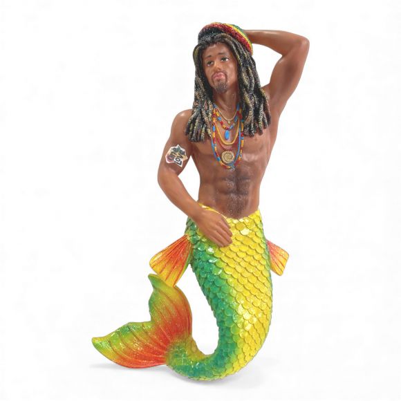 The One Love Ornament by December Diamonds features a hand-painted dark-skinned merman with beaded necklaces, a yellow, green, and red tail, long textured hair, and an arm tattoo—perfect for holiday décor or mermaid collections.
