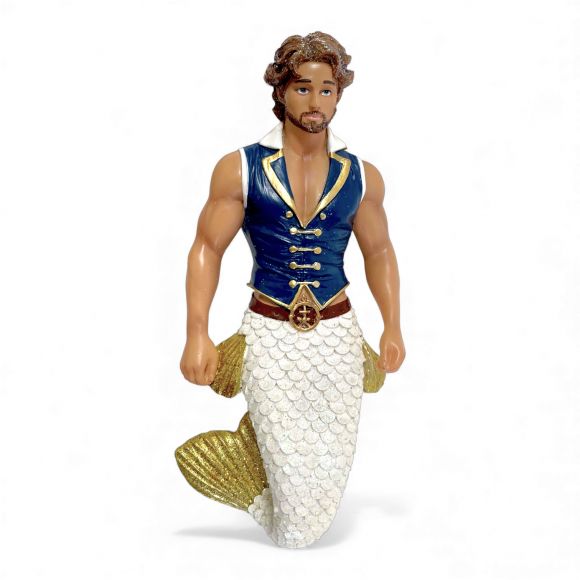 The Salty Seaman Ornament by December Diamonds features a muscular merman with brown curly hair, a blue and gold vest, and a white-gold tail—perfect for unique holiday decor or adding flair to your Merman ornaments collection.