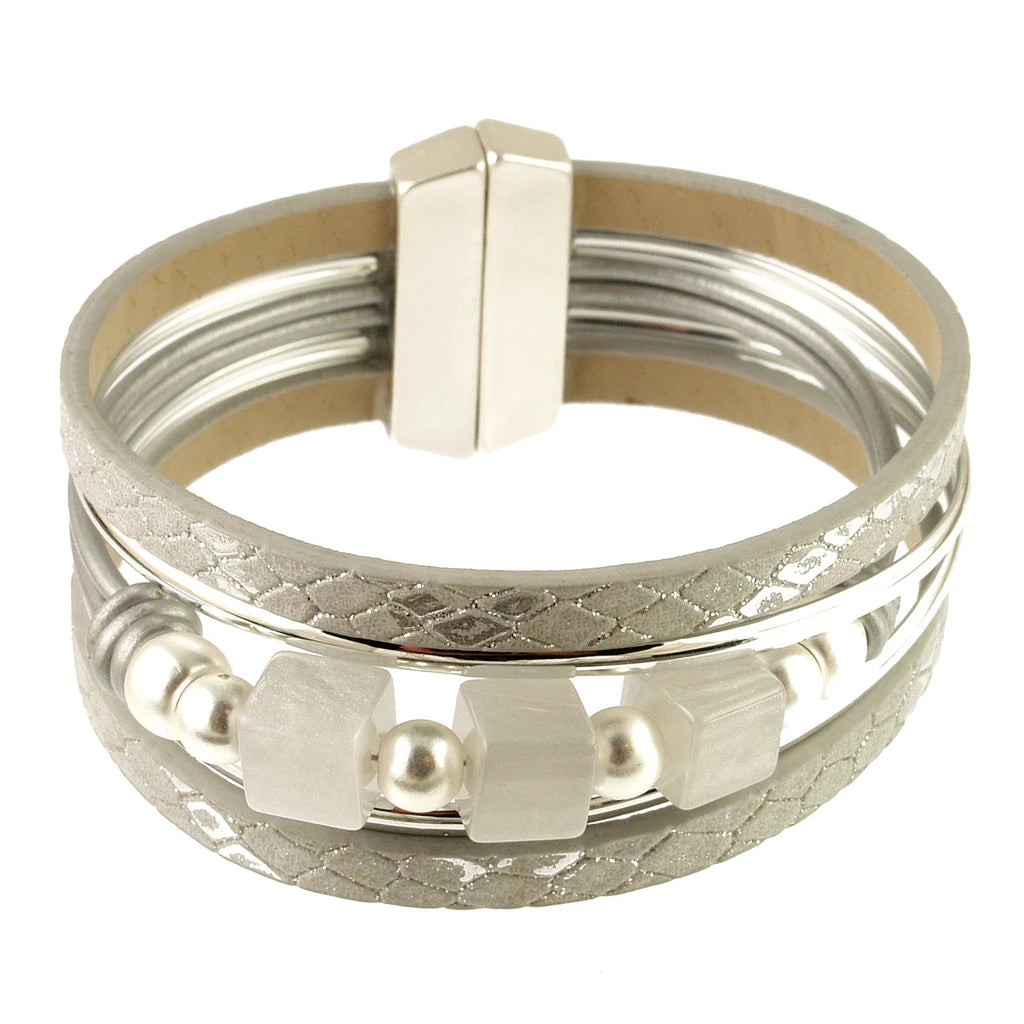 Origin Matte Silver/Light Gray Resin Magnetic Bracelet featuring multi-strand silver-toned bands, light gray textured straps, alternating metal beads, light gray square resin spacers, and a magnetic clasp.