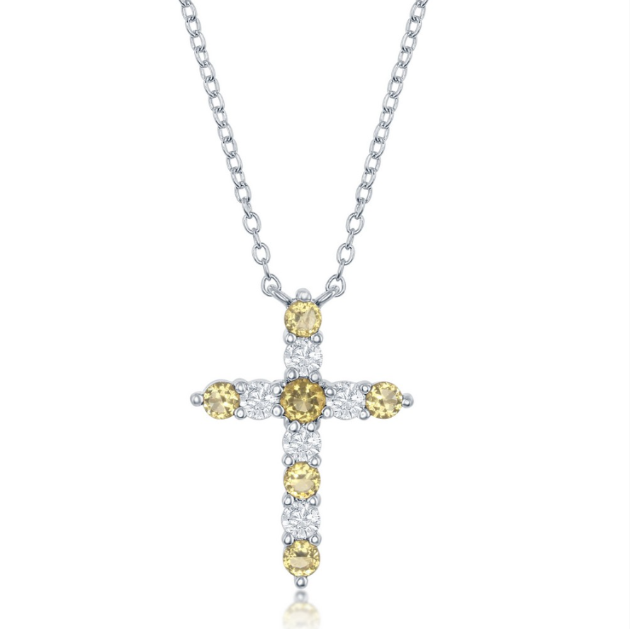 The Classic of New York Sterling Silver Birthstone Cross (November) Necklace features alternating yellow and white gemstones—making it a perfect citrine cross necklace for November birthstone jewelry lovers.
