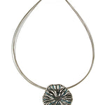 Origin Textured Round Organic Pendant Silver/Blue Necklace Set featuring a silver multi-strand wire design, an organic textured round pendant with blue accents, and a magnetic closure.