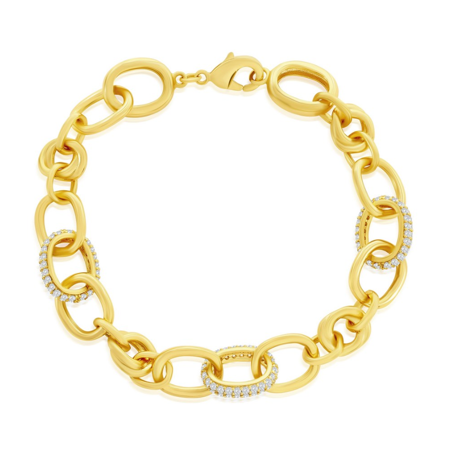The Classic of New York Gold Plated Micro Pave CZ & Polished Oval Bracelet features sparkling cubic zirconia accents and oval links with a secure lobster clasp closure.
