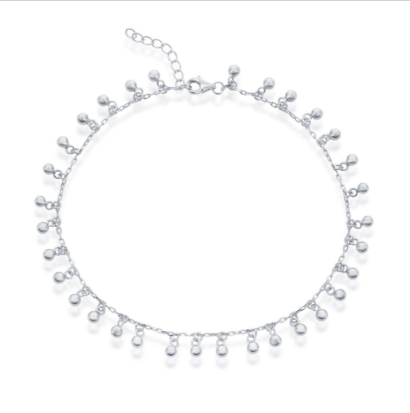 The Classic of New York Sterling Silver Beaded Dangle Charms Anklet features small, evenly spaced dangle charms on a 925 sterling silver chain, shown against a plain white background.
