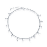 The Classic of New York Sterling Silver Moon & Star Double Strand Anklet features delicate star and crescent moon charms with an adjustable clasp, making it a charming accessory for any occasion.