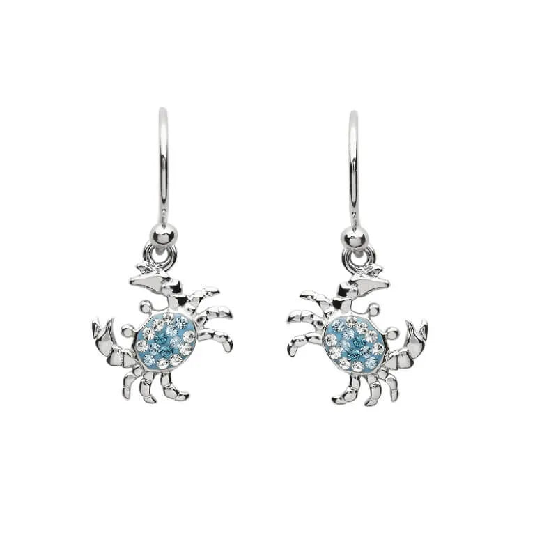 The Shanore Swarovski Crystals Blue Crab Drop Earrings from Ocean Jewelry feature crab-shaped designs with blue crystals, hypoallergenic materials, and comfortable hook fastenings for bold style and all-day wear.
