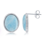 The Classic of New York Larimar Oval Bezel Set Post Earrings feature Caribbean blue gemstones in sterling silver, secured with post and butterfly backs. Shown from front and side angles on a white background.