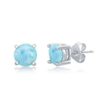 The Classic of New York Larimar 6MM Round 4 Prong Post Earrings feature light blue gemstones from the Dominican Republic in sterling silver settings, with butterfly backings visible on one earring.