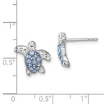 The Presco/Quality Gold Swarovski Crystals Light Blue Turtle Post Earrings feature small sterling silver turtles with blue and clear crystals. Each earring measures about 0.5 inches long and is shown on a white background with a ruler for scale.