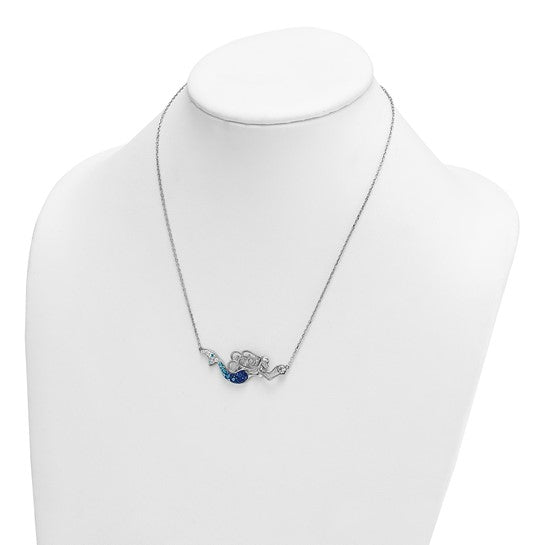 The Crystal Mermaid Necklace by Presco/Quality Gold features a sterling silver pendant with blue and light blue crystal accents on a delicate chain, beautifully displayed on a white mannequin bust.