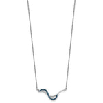 The Presco/Quality Gold Crystal Blue Wave Inlay Necklace showcases a delicate wavy pendant with blue accents on a simple silver chain, elegantly displayed against a white background.