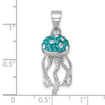 The Presco/Quality Gold Crystal Jellyfish Pendant features a turquoise gemstone body and textured sterling silver tentacles, shown on a white background with a grid indicating the pendant is approximately 1 inch tall.