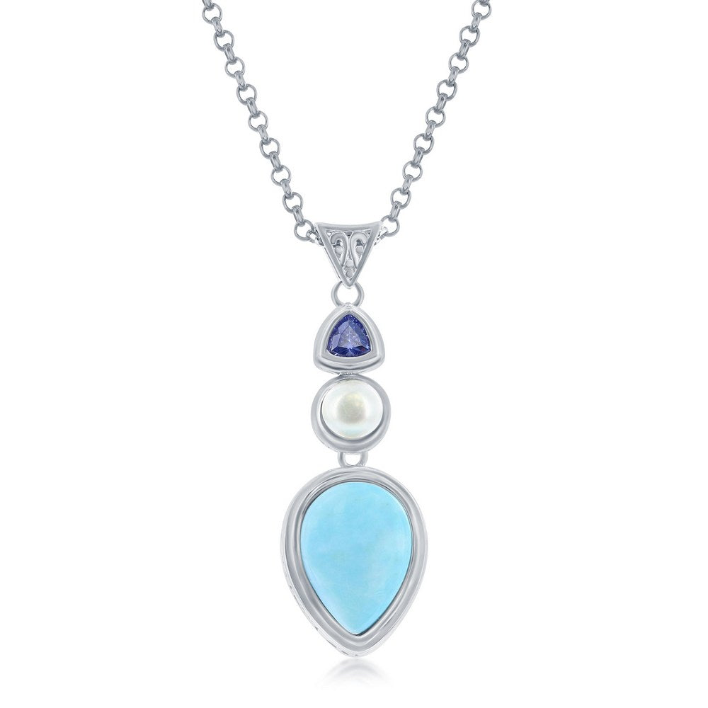 The Classic of New York Larimar Upside Down Teardrop w/ Pearl & Tanzanite CZ Necklace features a sterling silver pendant with a light blue teardrop Larimar, round white pearl, and blue tanzanite CZ set vertically on a chain.