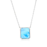 The Classic of New York Larimar Rectangle Bezel Necklace features a silver chain and a rhodium-plated, softly rounded sky blue gemstone pendant.