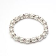 The MagneHealth BR: White & Crystal Magnetic Stretch 7 features round white pearls and crystal spacers in a circular display, offering elegant magnetic jewelry on a plain white background.