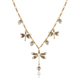 The Dragonfly w/Triple Crystal Drop Collar Necklace by Anne Koplik Designs, Inc. features a vintage-inspired design with dragonfly and triple crystal drops arranged on a delicate chain for an antique-style jewelry look.