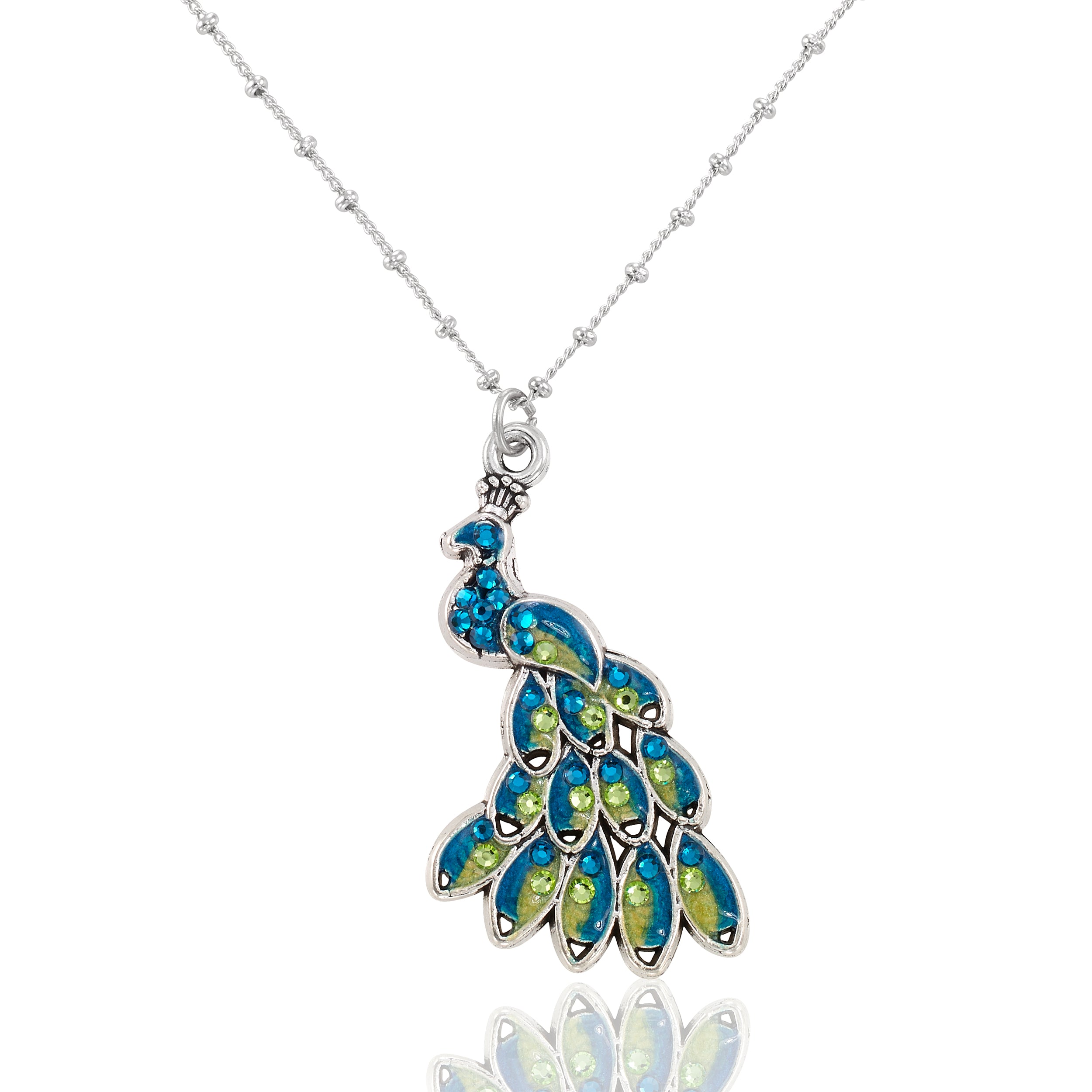 The Whimsy Stone & Enamel Male Peacock Necklace by Anne Koplik Designs features a peacock pendant adorned with blue and green gemstones, hand-enameled details, and hangs from a delicate beaded chain.