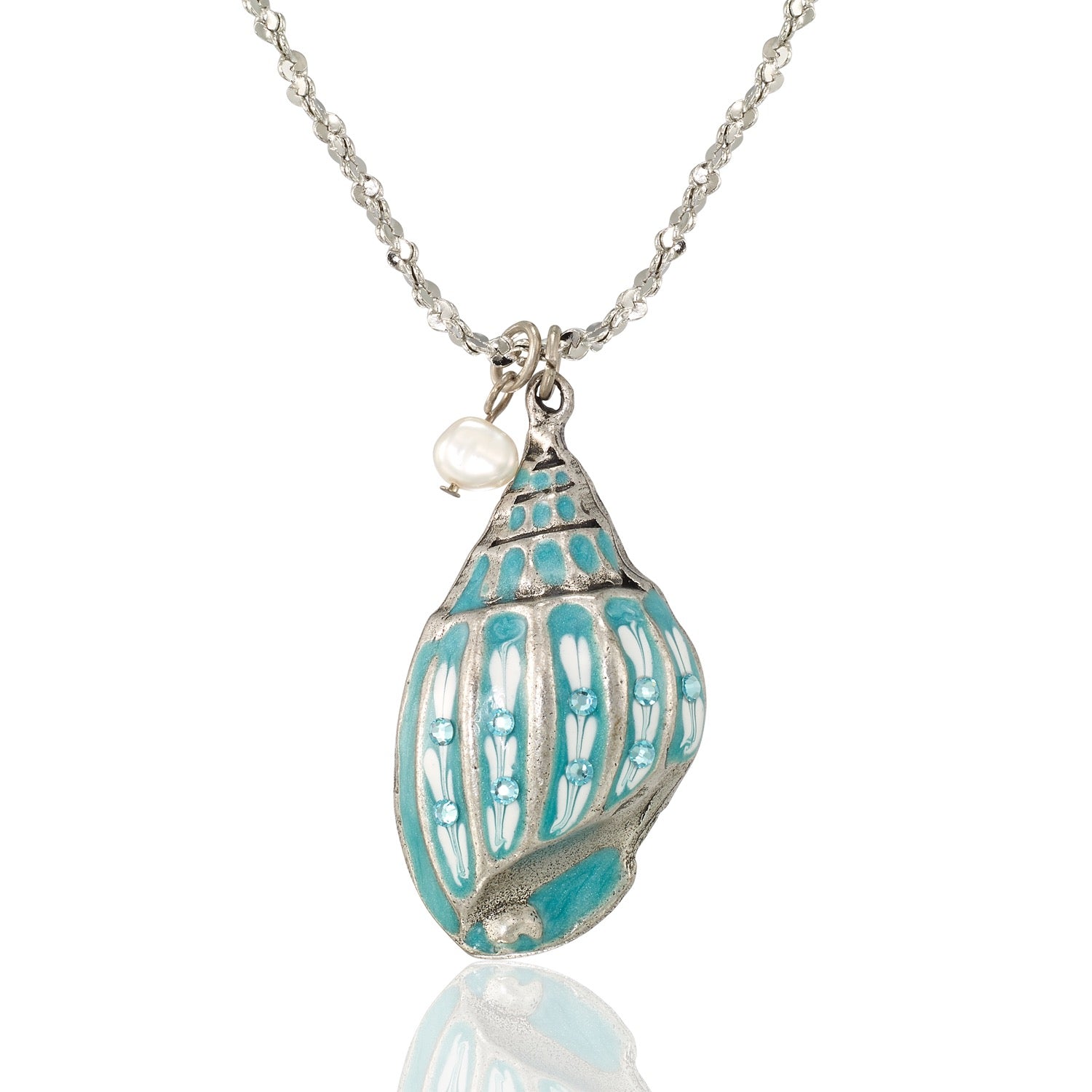 The Anne Koplik Designs, Inc. Turquoise Enamel Pearl Seashell Jumble Necklace features a silver chain with a blue and white seashell pendant and a small pearl, capturing ocean-inspired beauty on a white display.