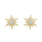 Shanore's Gold Vermeil & White Sapphire Sun Post Earrings feature starburst studs with a central cluster of white sapphires, each point elegantly accented with additional gemstones.