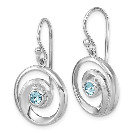 The Crystal Wave Dangle/Aqua Earrings by Presco/Quality Gold are sterling silver earrings featuring swirling circular designs and a central round aqua Swarovski crystal.